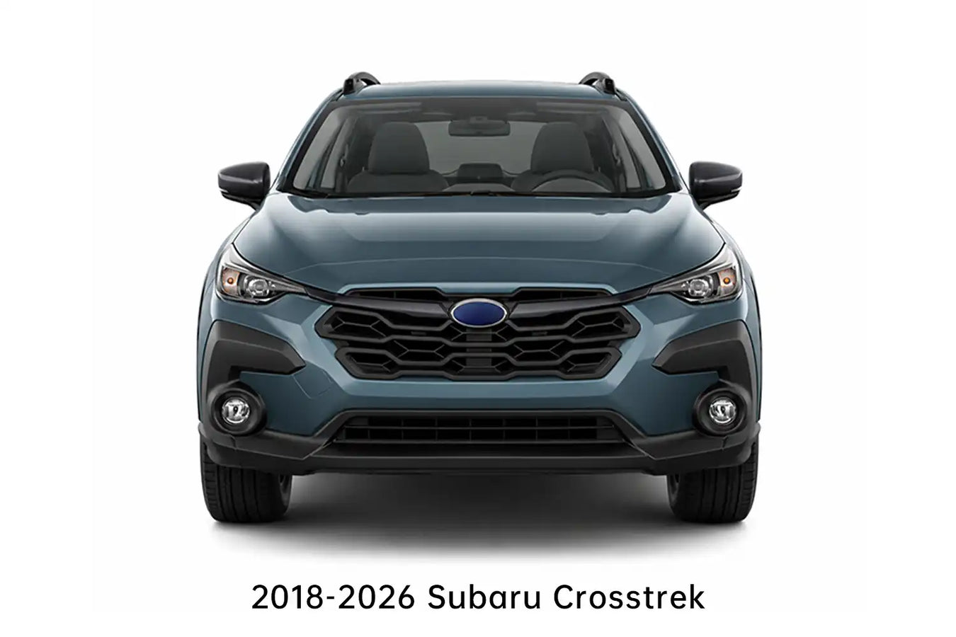 Front view of a 2018-2026 Subaru Crosstrek in grey-blue, showcasing its front grille, headlights, and roof rails against a clean white background, with text at the bottom.