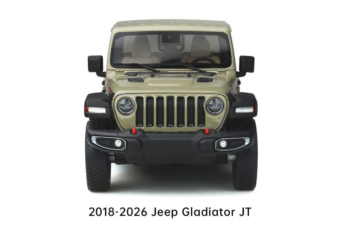 Front view of a 2018-2026 tan Jeep Gladiator JT pickup truck, featuring the iconic seven-slot grille, round headlights, and red tow hooks.