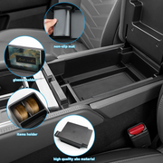 Installed armrest storage tray inside vehicle center console