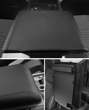 Installed center console armrest cover for Ford F150 showing snug fit on armrest lid without wrinkles, designed for 2021-2026 models