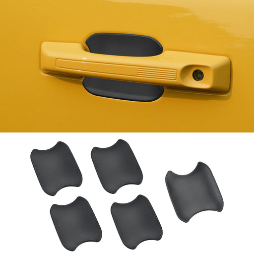 Matte black door handle bowl covers installed on Ford Bronco exterior