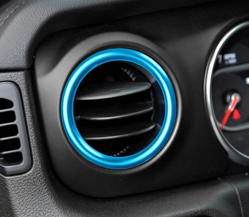 blue vent ring trim mounted on original vehicle air vent